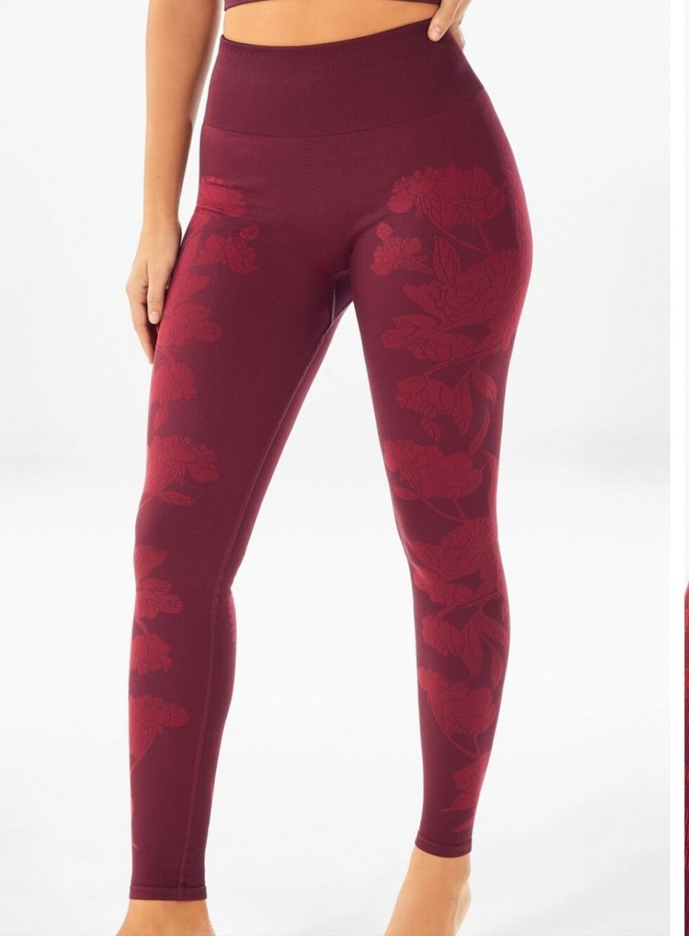 These are Fabletics Rosette High-Waisted Seamless Leggings in a Port Wine